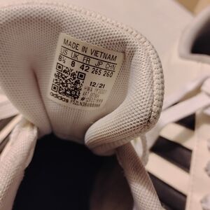 Adidas White Sneakers with Black Stripes